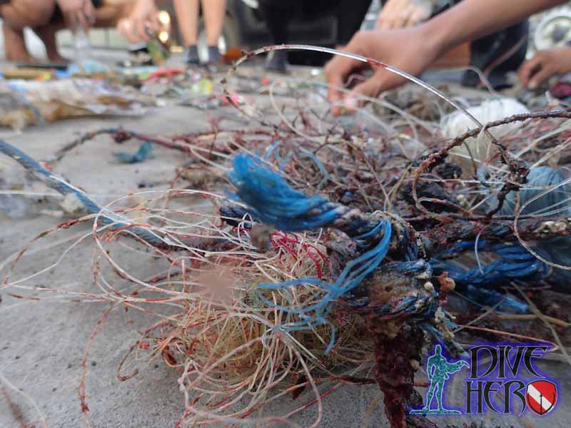 sorting out the rubbish after a Project Aware Dive Against Debris dive