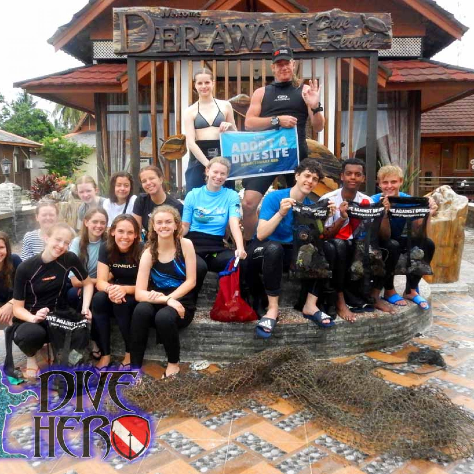 volunteers on Derawan Island show off their debris after a Project AWARE Dive Against Debris